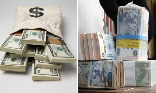 Des liasses de dollars américains et du Franc congolais_(Photo d'illusstration)